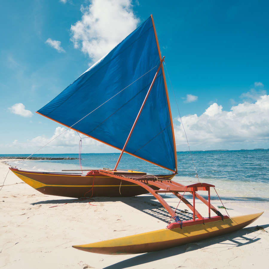 Catamaran sailboat on beach